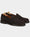 Still life photo of a dark brown Velasca penny loafer.