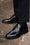 A close up of Velasca formal lace-up shoes, black in smooth leather.