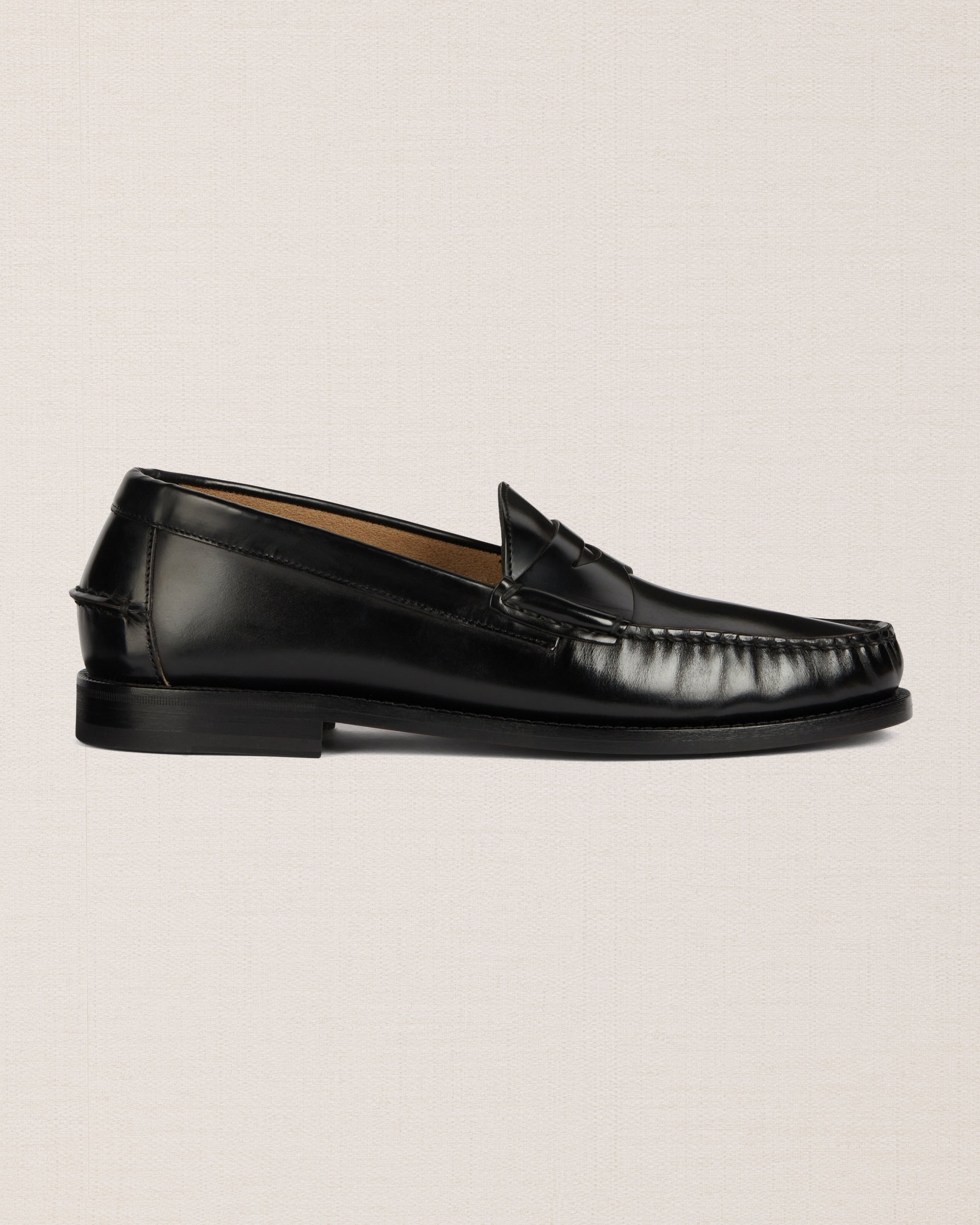 Velasca | Black leather tasseled loafers. Made in Italy